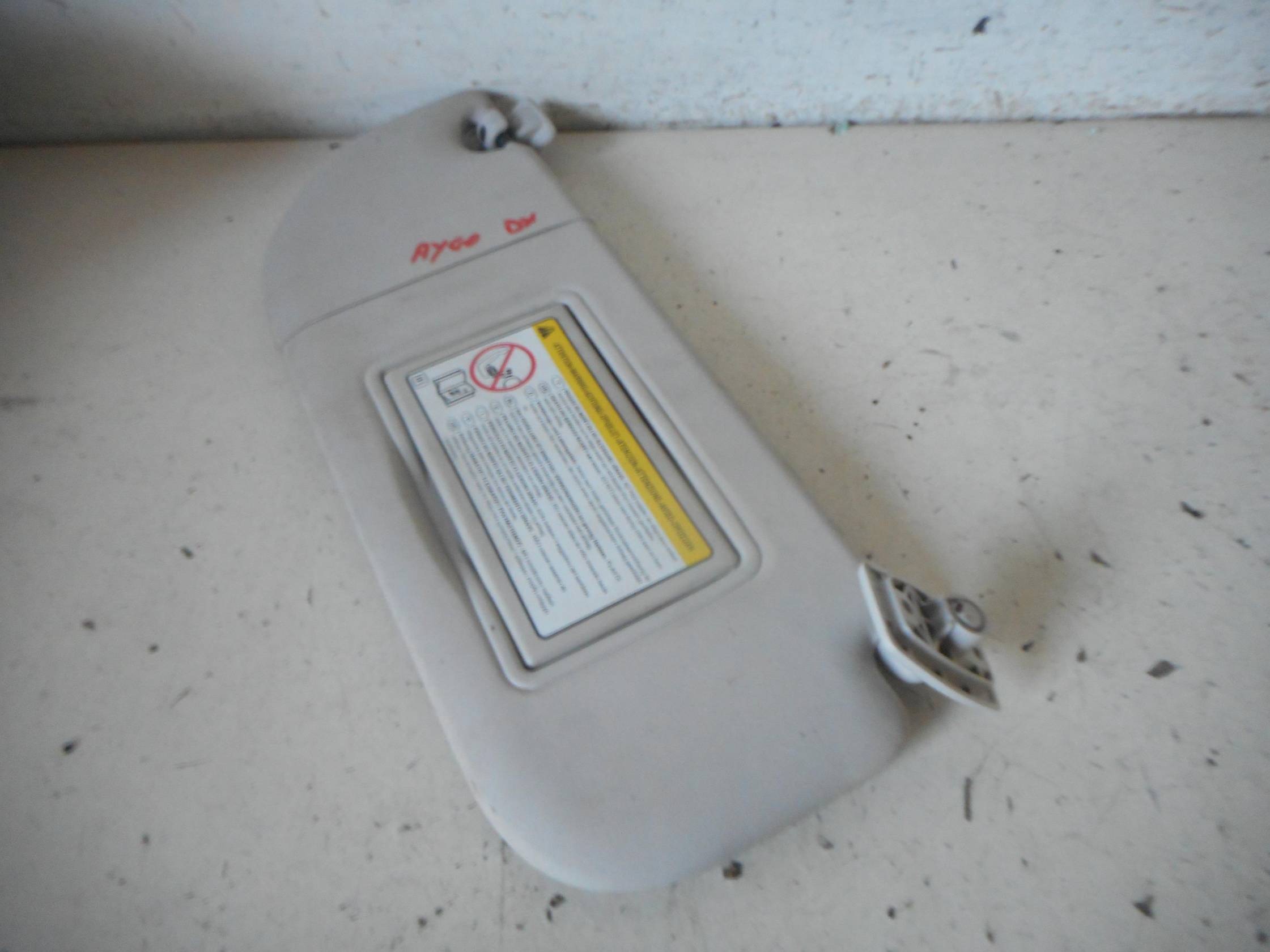 Aletta parasole parabrezza dx.